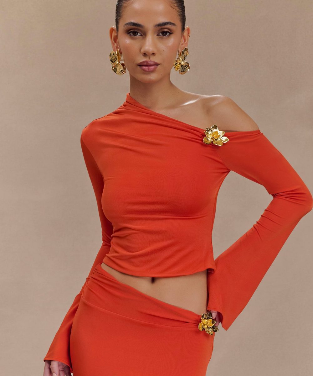 Ainsley Asymmetrical Long Sleeve Top With Floral Hardware - Burnt Orange